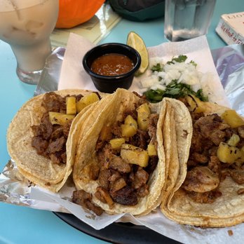 Dona Tola - Taquitos al pastor con piña - Mexican Near Me - Chicago, Illinois Dona Tola - Taquitos al pastor con piña - Mexican Near Me - Chicago, Illinois