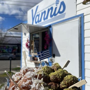 Yanni’s Greek Donuts - Large - Half Coconut & Half Pistachio Chocolate - Coffee & Tea Near Me - Portland, Oregon Yanni’s Greek Donuts - Large - Half Coconut & Half Pistachio Chocolate - Coffee & Tea Near Me - Portland, Oregon