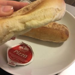 Papa Johns Pizza - I prefer doughy breadsticks to crispy ones, but not like this. The middle is still uncooked. Such a bummer