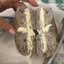 Blueberry bagel toasted with extra cream cheese