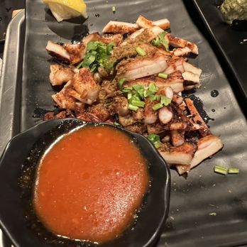 Khan Skewer Restaurant - Whole squid, cut and hiding underneath were some really small pieces. - Barbeque Near Me - Honolulu, Hawaii Khan Skewer Restaurant - Whole squid, cut and hiding underneath were some really small pieces. - Barbeque Near Me - Honolulu, Hawaii