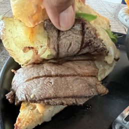 My first prime rib sandwich. Luckily I took a photo & was able to show the manager when he eventually came by. Sear marks on prime rib? My first prime rib sandwich. Luckily I took a photo & was able to show the manager when he eventually came by. Sear marks on prime rib?