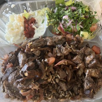 Pita Pockets - Lamb and beef platter with salad and garlic, fire, and tzaziki spreads - Mediterranean Near Me - Key Biscayne, Florida