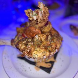 Fade + Facet - a plate of food with shrimp - food - Hookah Bars Near Me - Duluth, Georgia