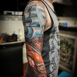 Blue Byrd Tattoo & Body Piercing - Tattoo done by Erik Kushner