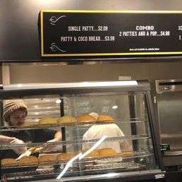 a man working in a bakery a man working in a bakery