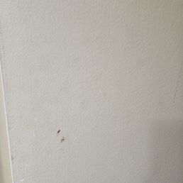 One of the red stains on the bathroom door. One of the red stains on the bathroom door.