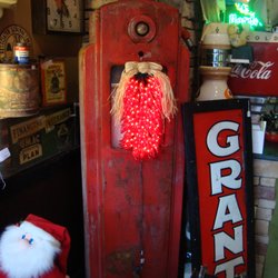 Johnny Junk & Co. - An antique gas pump with light-up chili peppers (not antique).
