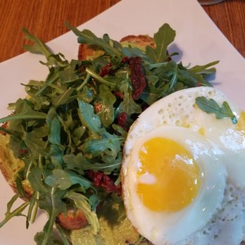 The Cafe Krave - Krave Avocado Toast So fresh and healthy! arugula,sundried tomatoes, and 2 over meidium eggs on top - Coffee & Tea Near Me - Anaheim, California The Cafe Krave - Krave Avocado Toast So fresh and healthy! arugula,sundried tomatoes, and 2 over meidium eggs on top - Coffee & Tea Near Me - Anaheim, California