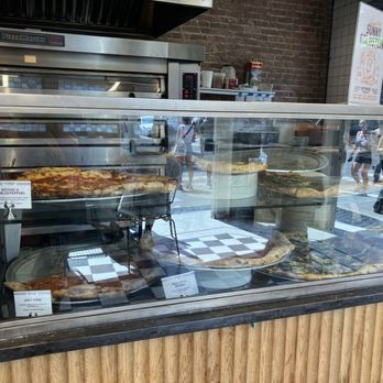 Upside Pizza - Upside Pizza display case - Pizza Near Me - New York, New York