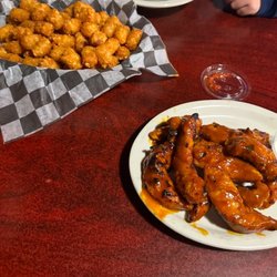 Old Well Tavern - Boneless Gary wings and tots when they were good before the new owner came around and ruined the Old Well Taverns chicken.