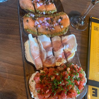 Postino Buckhead - Bruschetta Board- Salmon, prosciutto, burrata bacon - Wine Bars Near Me - Atlanta, Georgia Postino Buckhead - Bruschetta Board- Salmon, prosciutto, burrata bacon - Wine Bars Near Me - Atlanta, Georgia