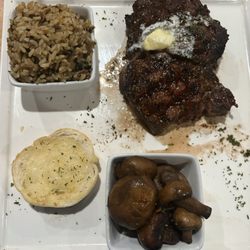 The Ribeye with wild rice and mushrooms