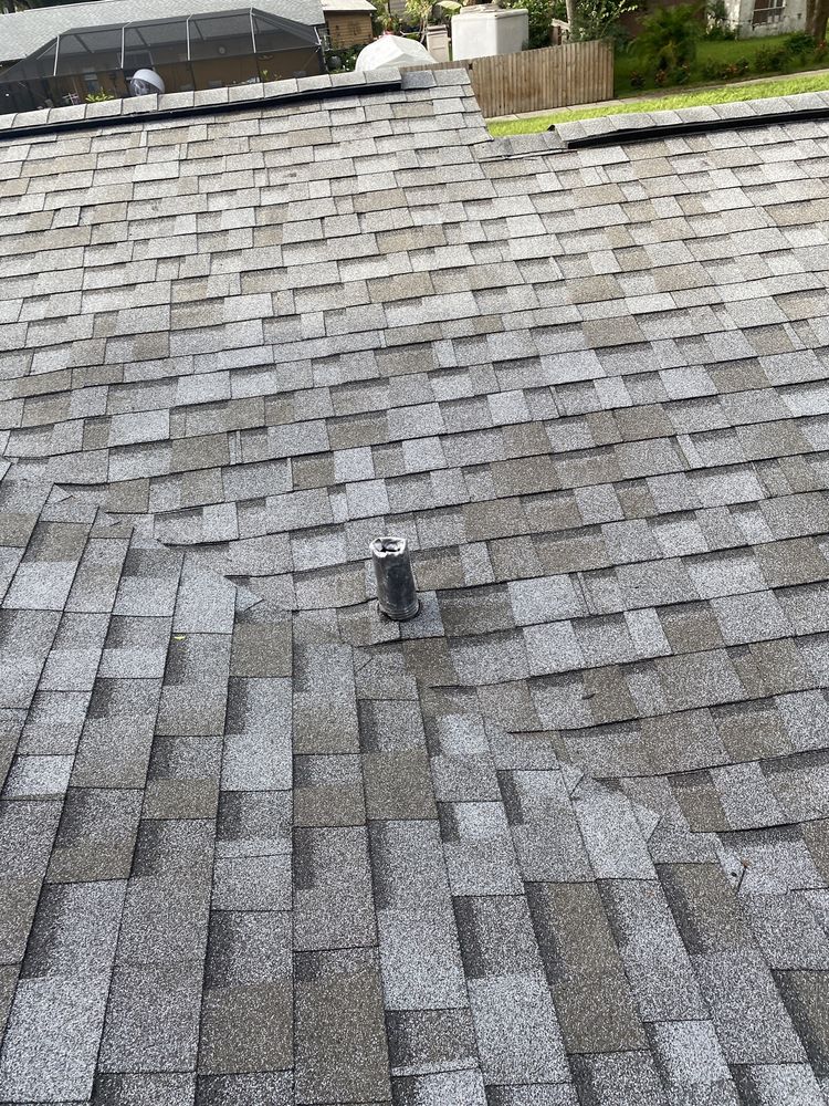 Slide of CB Roofing Construction