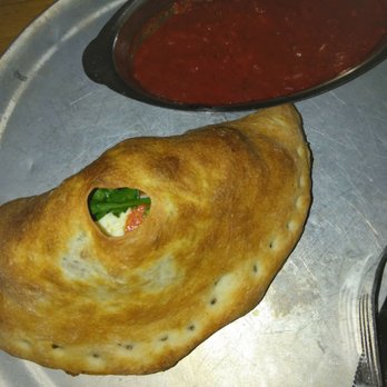 Fellini's Pizza - Spinach and pepperoni calzone!! Really yummy!! - Pizza Near Me - Atlanta, Georgia Fellini's Pizza - Spinach and pepperoni calzone!! Really yummy!! - Pizza Near Me - Atlanta, Georgia