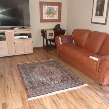 Curtis Carpets - We decided against a larger rug because it'd be a shame to eclipse the beautiful flooring! - Flooring Near Me - Santa Barbara, California