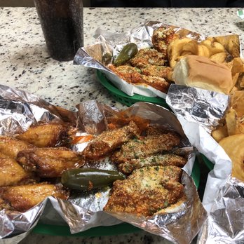 Dream Wings - Honey Sriracha(left) and buffalo lemon pepper parmesan - Chicken Wings Near Me - Houston, Texas Dream Wings - Honey Sriracha(left) and buffalo lemon pepper parmesan - Chicken Wings Near Me - Houston, Texas