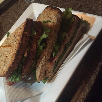 Coffee Culture - a sandwich on a white plate - Coffee & Tea Near Me - Alliston, Ontario