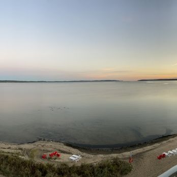 Cherry Tree Inn & Suites - View of the sunrise and beach below us - Hotels Near Me - Traverse City, Michigan Cherry Tree Inn & Suites - View of the sunrise and beach below us - Hotels Near Me - Traverse City, Michigan