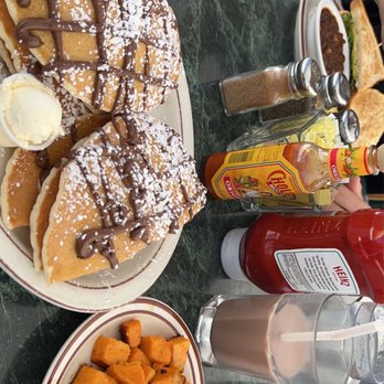Hobee's Restaurant - Nutella stacked pancakes with a side of sweet potatoes - Breakfast & Brunch Near Me - Sunnyvale, California Hobee's Restaurant - Nutella stacked pancakes with a side of sweet potatoes - Breakfast & Brunch Near Me - Sunnyvale, California