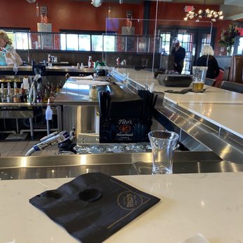 Red’s Kitchen + Tavern - Dividers at the bar and every inside seat - American Near Me - Seabrook, New Hampshire Red’s Kitchen + Tavern - Dividers at the bar and every inside seat - American Near Me - Seabrook, New Hampshire