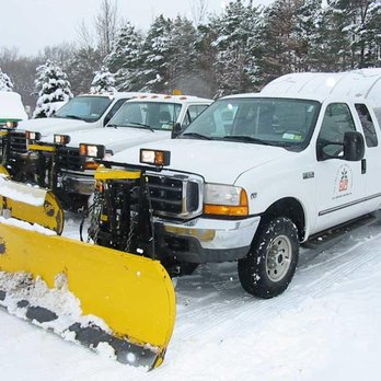 Country Side Services - a row of snow plows - General Contractors Near Me - Anoka, Minnesota Country Side Services - a row of snow plows - General Contractors Near Me - Anoka, Minnesota