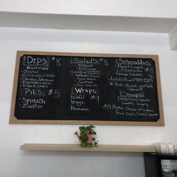 Mouna's Delicacies - a menu on a blackboard - Street Vendors Near Me Mouna's Delicacies - a menu on a blackboard - Street Vendors Near Me