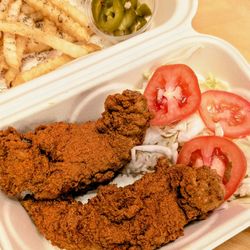 Byrd's Hot Chicken - Chicken tenders, tomatoes, cabbage, fries, homemade coleslaw, and jalapeños