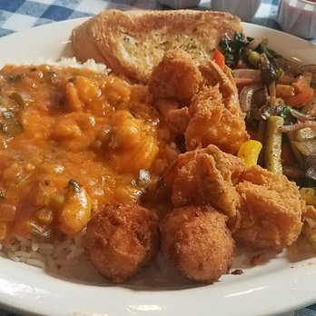 The Catch - Arlington - Shrimp half & half: half orders of fried shrimp and etouffee. Comes with hush puppies, garlic bread, & two sides (mixed veggies pictured). - Seafood Near Me - Arlington, Texas The Catch - Arlington - Shrimp half & half: half orders of fried shrimp and etouffee. Comes with hush puppies, garlic bread, & two sides (mixed veggies pictured). - Seafood Near Me - Arlington, Texas