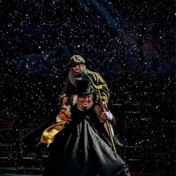Center Stage Theater - The director as Ebeneezer Scrooge with tiny Tim.