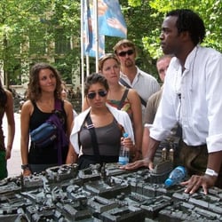 Oztour Munich - Ozzie with guests overlooking Munich map.