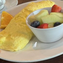 Western omlet with fruit side Western omlet with fruit side