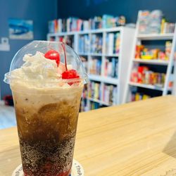 The Portal board games and custom sodas - Cherry Blast is Coca-Cola, cherry, vanilla, cream, cherries and whipped topping.