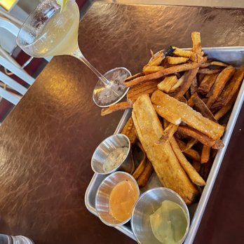 Union Assembly - House cut fries and dips (as you can see the fries we're almost/partially cut) - New American Near Me - Detroit, Michigan Union Assembly - House cut fries and dips (as you can see the fries we're almost/partially cut) - New American Near Me - Detroit, Michigan