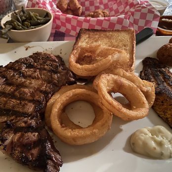 The Chatterbox Restaurant - Ribeye(MR) and Catfish Fish(blackened) with green beans, onion rings, and hush puppies. - Southern Near Me - Byhalia, Mississippi The Chatterbox Restaurant - Ribeye(MR) and Catfish Fish(blackened) with green beans, onion rings, and hush puppies. - Southern Near Me - Byhalia, Mississippi