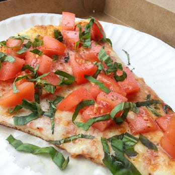 Pie-zan's - Slice of pizza with tomatoes and basil. - Pizza Near Me - Fort Lauderdale, Florida Pie-zan's - Slice of pizza with tomatoes and basil. - Pizza Near Me - Fort Lauderdale, Florida