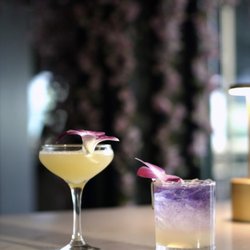 Kai Lounge - Sushi Bar & Kitchen - Craft cocktails at Kai Japanese Bistro framed by our cherry blossom tree in Huntington Beach.