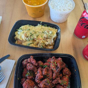 Mirch Masala - Chicken 65 (bottom) Samosa chaat (middle) Chicken tikka masala (top) Garlic naan (not pictured was also so good) - Grocery Near Me - Lubbock, Texas