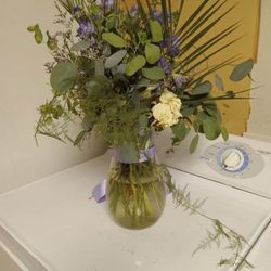 Back of arrangement I was asked to take a pic. By the florist.