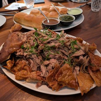 Serevene - @endoedibles on IG 10/26/24  #PORKISMYFAVORITEVEGETABLE - 1⁄2 suckling pig, sérêvène sauce tray, king's hawaiian soft rolls - French Near Me - Miami Beach, Florida