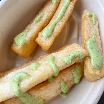 Bae Latin Food - Yucca fries with parsley sauce. - Venezuelan Near Me - Carmel, Indiana Bae Latin Food - Yucca fries with parsley sauce. - Venezuelan Near Me - Carmel, Indiana