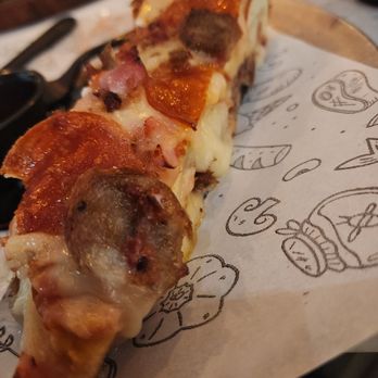 Due Amici Pizza & Pasta Bar - Half of my slice of Meat Pizza - Pizza Near Me - Tampa, Florida Due Amici Pizza & Pasta Bar - Half of my slice of Meat Pizza - Pizza Near Me - Tampa, Florida