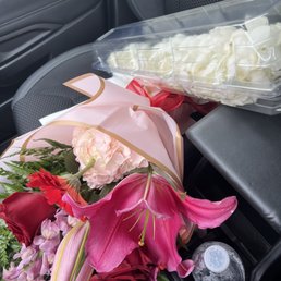 Double white orchid lei, custom bouquet
