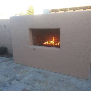 Twins Construction - Travertine papers with a out door fire place - General Contractors Near Me Twins Construction - Travertine papers with a out door fire place - General Contractors Near Me