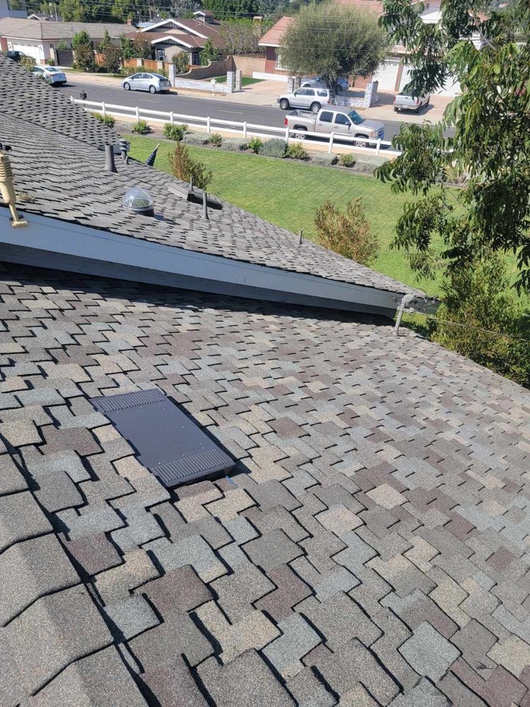 Slide of DV Roofing