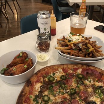 Nomad Eatery - Pizza-meatizza (I think that was the name), cheese fries, and the buffalo wings - New American Near Me - South Jordan, Utah Nomad Eatery - Pizza-meatizza (I think that was the name), cheese fries, and the buffalo wings - New American Near Me - South Jordan, Utah