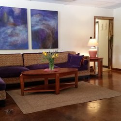 Ebb & Flow Massage Therapy Center - Local art graces the walls of our spacious reception area