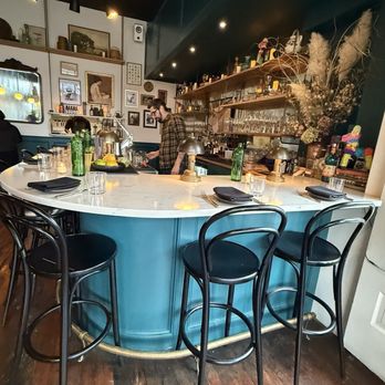 Dame - The bar greets you as you step into the space. - Wine Bars Near Me - Portland, Oregon