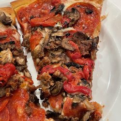 Flying Pie Pizzeria - Good amount of toppings but you pay the price at $5-6 each