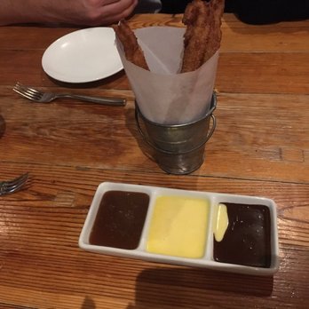 The Grocery - Churros: salted caramel sauce, crepe anglaise & fudge sauce. - Southern Near Me - Charleston, South Carolina The Grocery - Churros: salted caramel sauce, crepe anglaise & fudge sauce. - Southern Near Me - Charleston, South Carolina